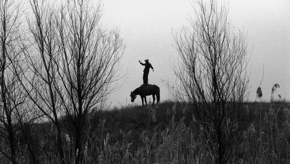 Cossack Valerka. Standing in all growth in a saddle